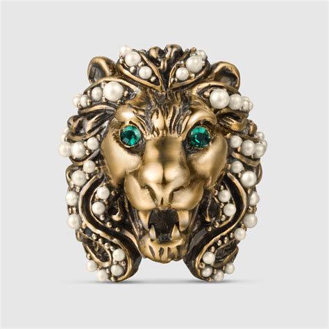 gucci ring silver 4 lion heads|Gucci lion mane ring.